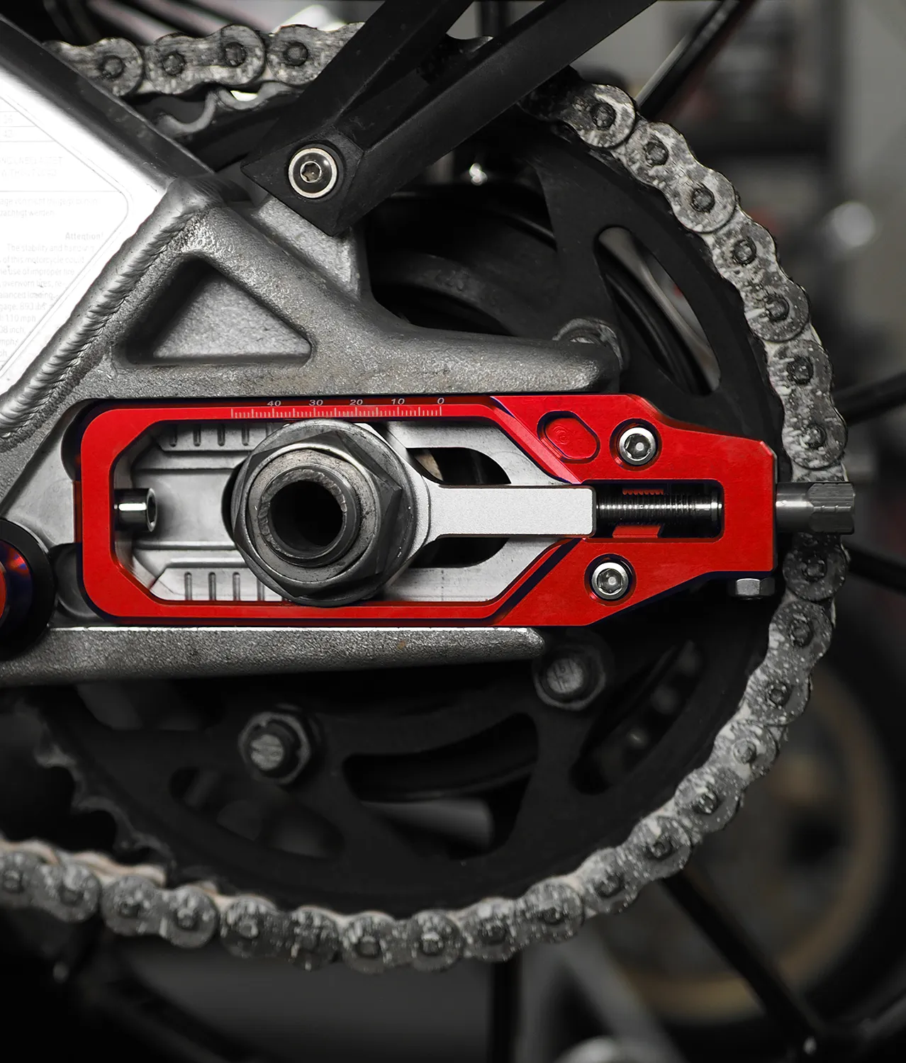 PitX Renntechnik Kettenspanner in Rot für sportliche Motorräder und Rennstrecke